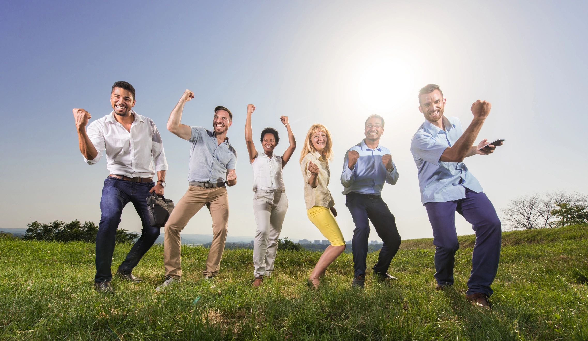 diverse happy people achieving success